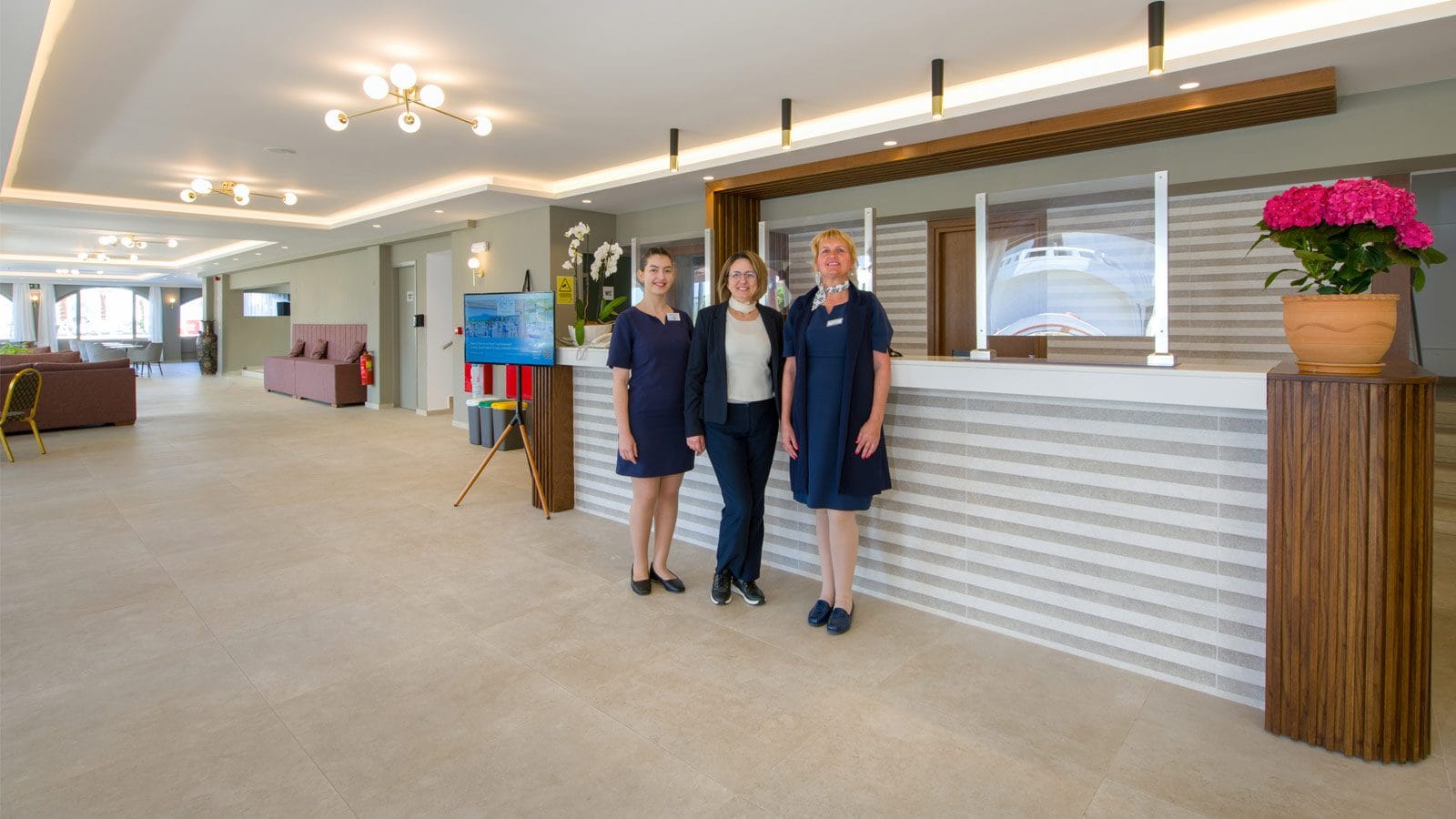 a few women standing in a large room