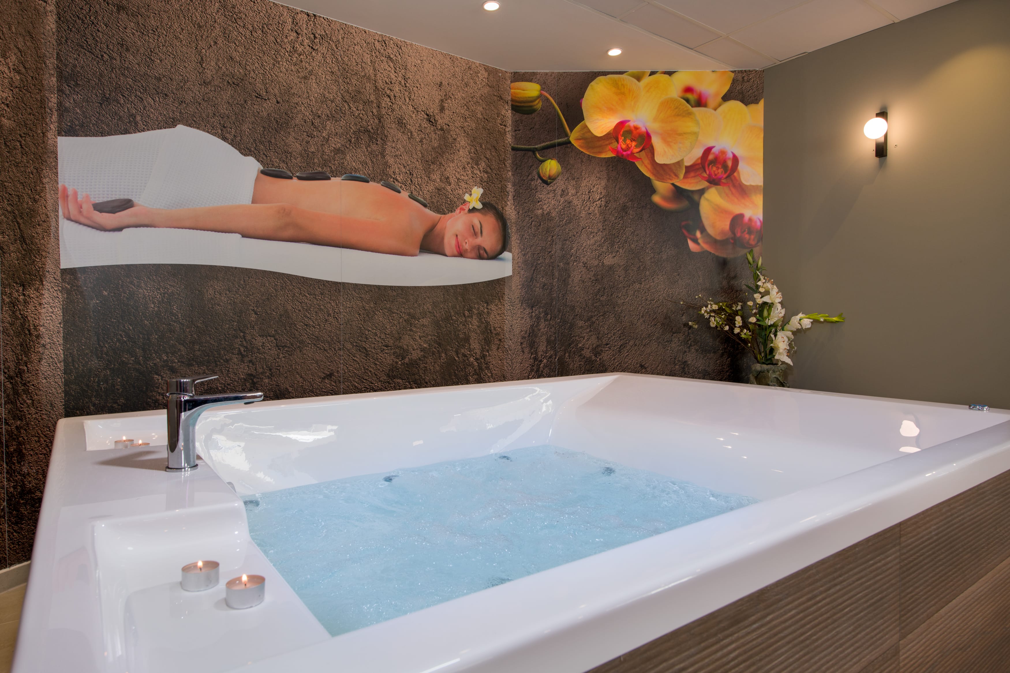 a person lying in a bathtub
