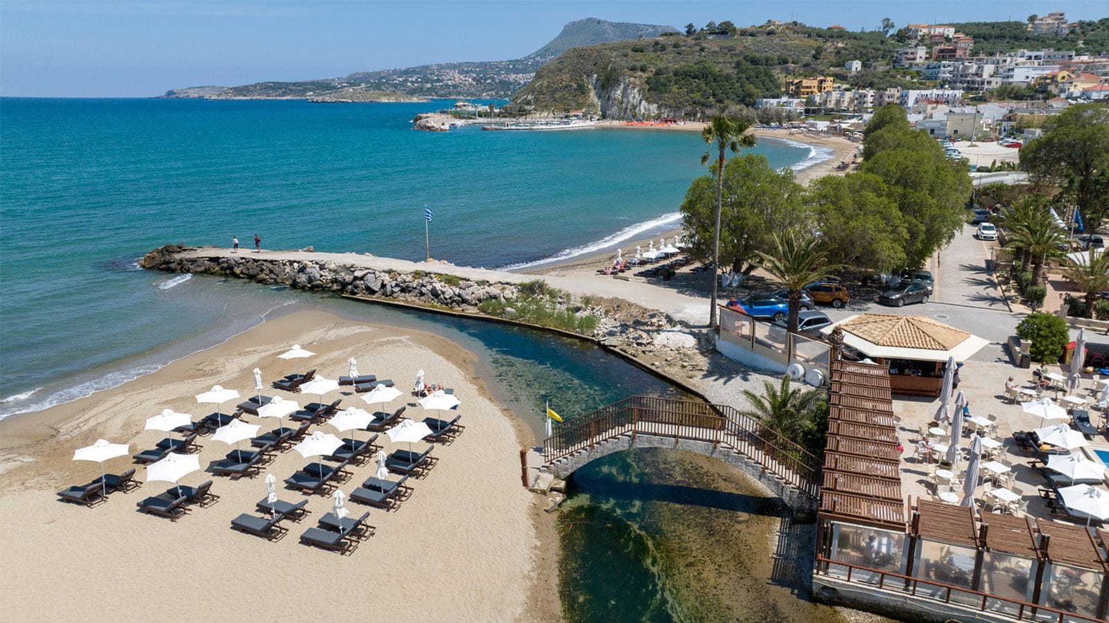 a beach with cars parked on it