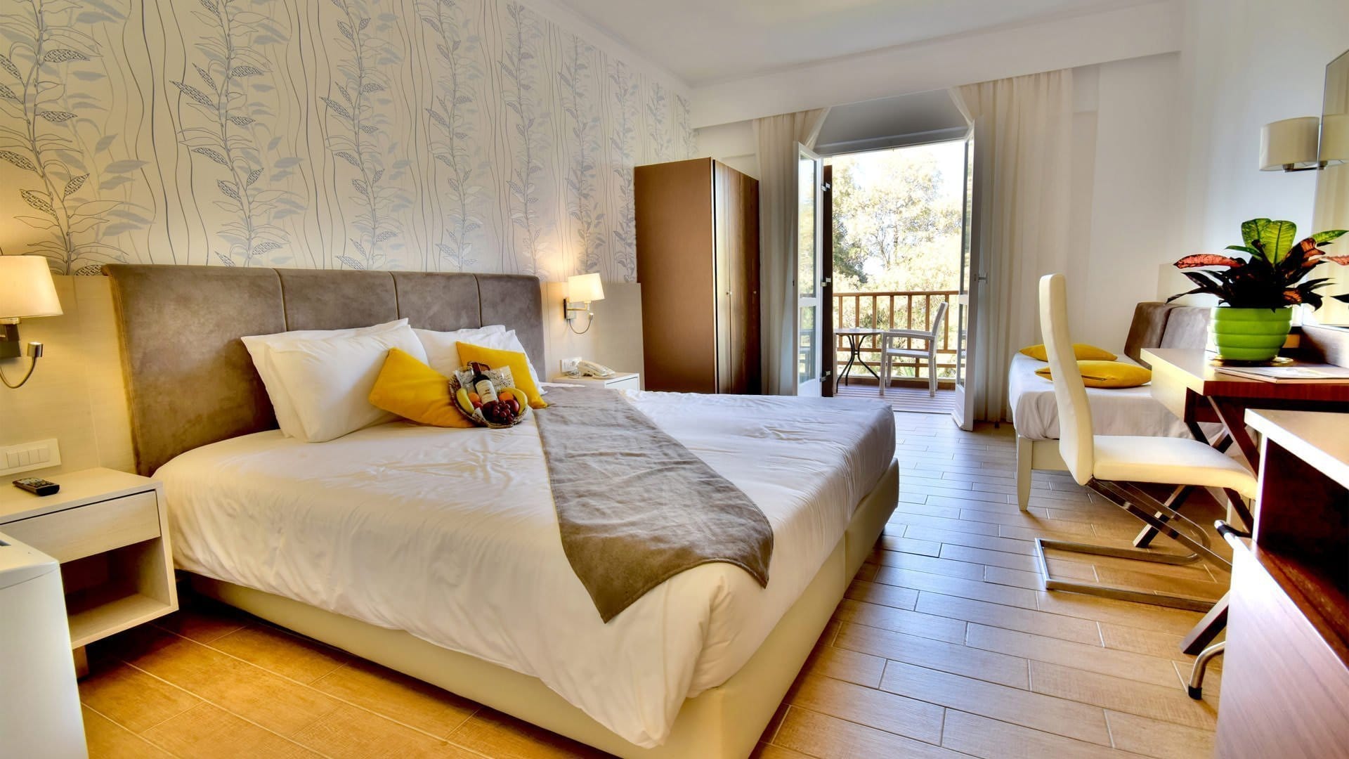 a bedroom with a bed and a chair