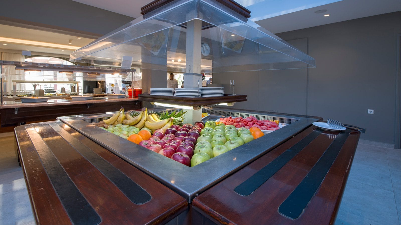 a buffet with fruits and vegetables