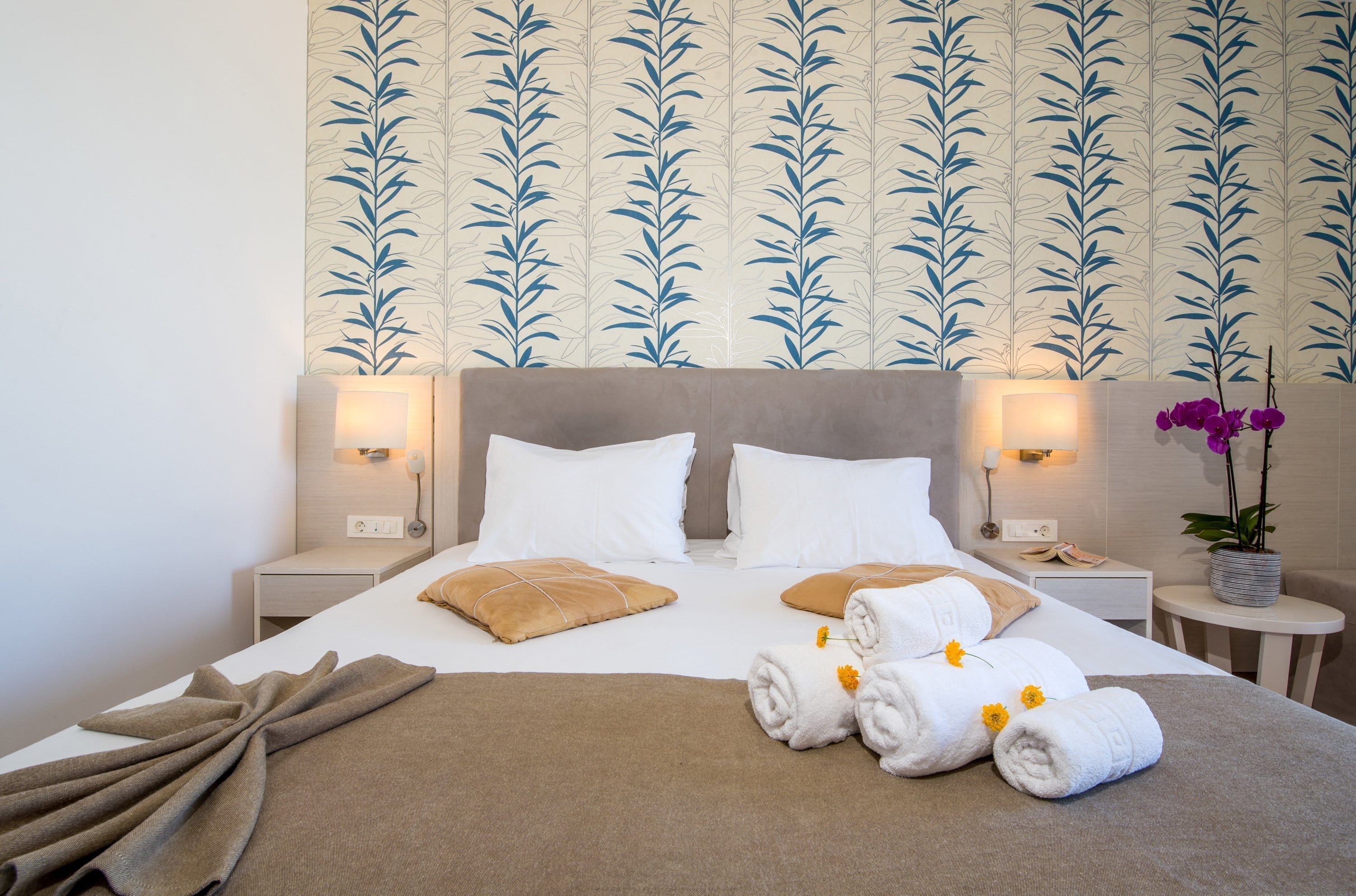 a bed with a white bed spread