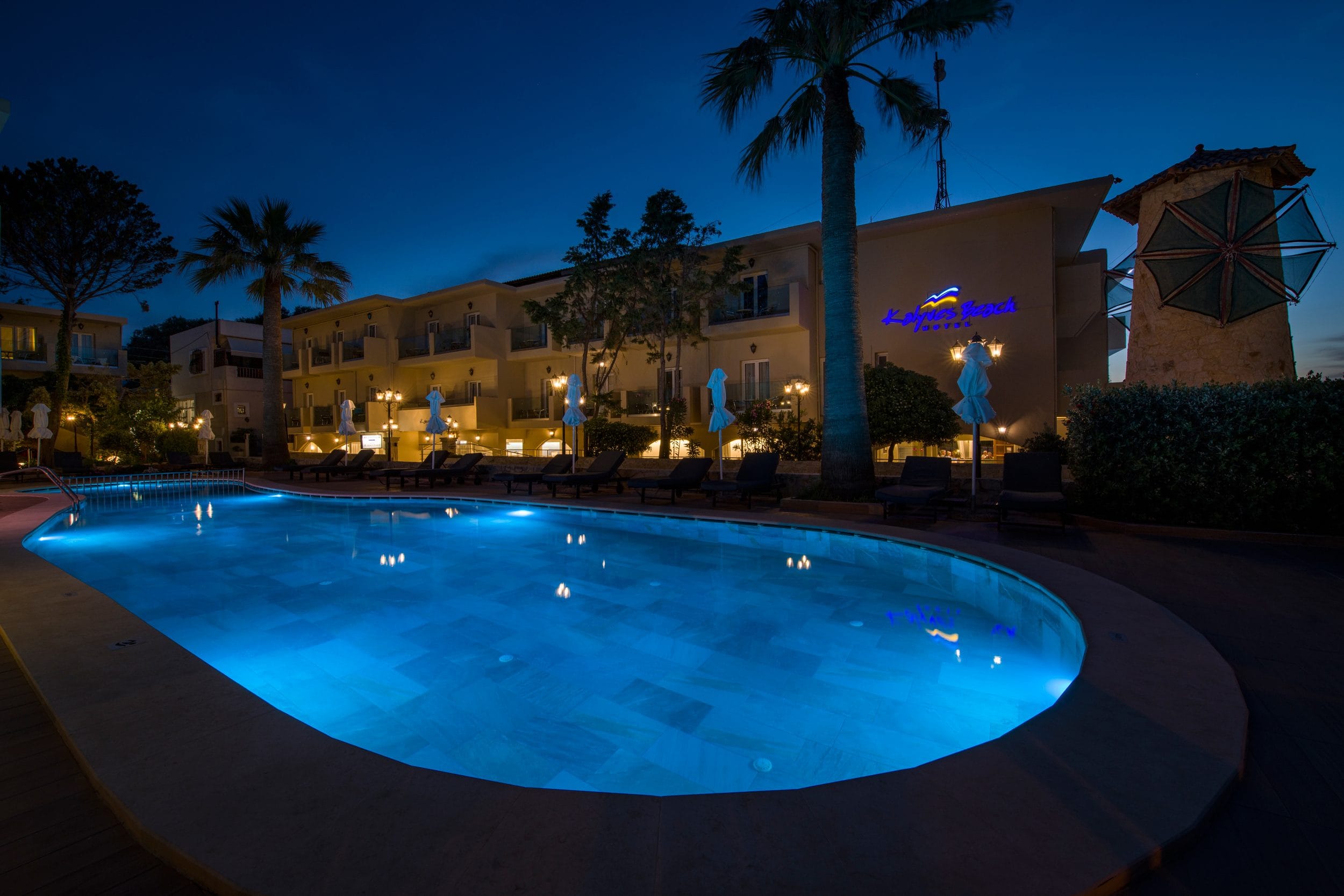 a pool in front of a building