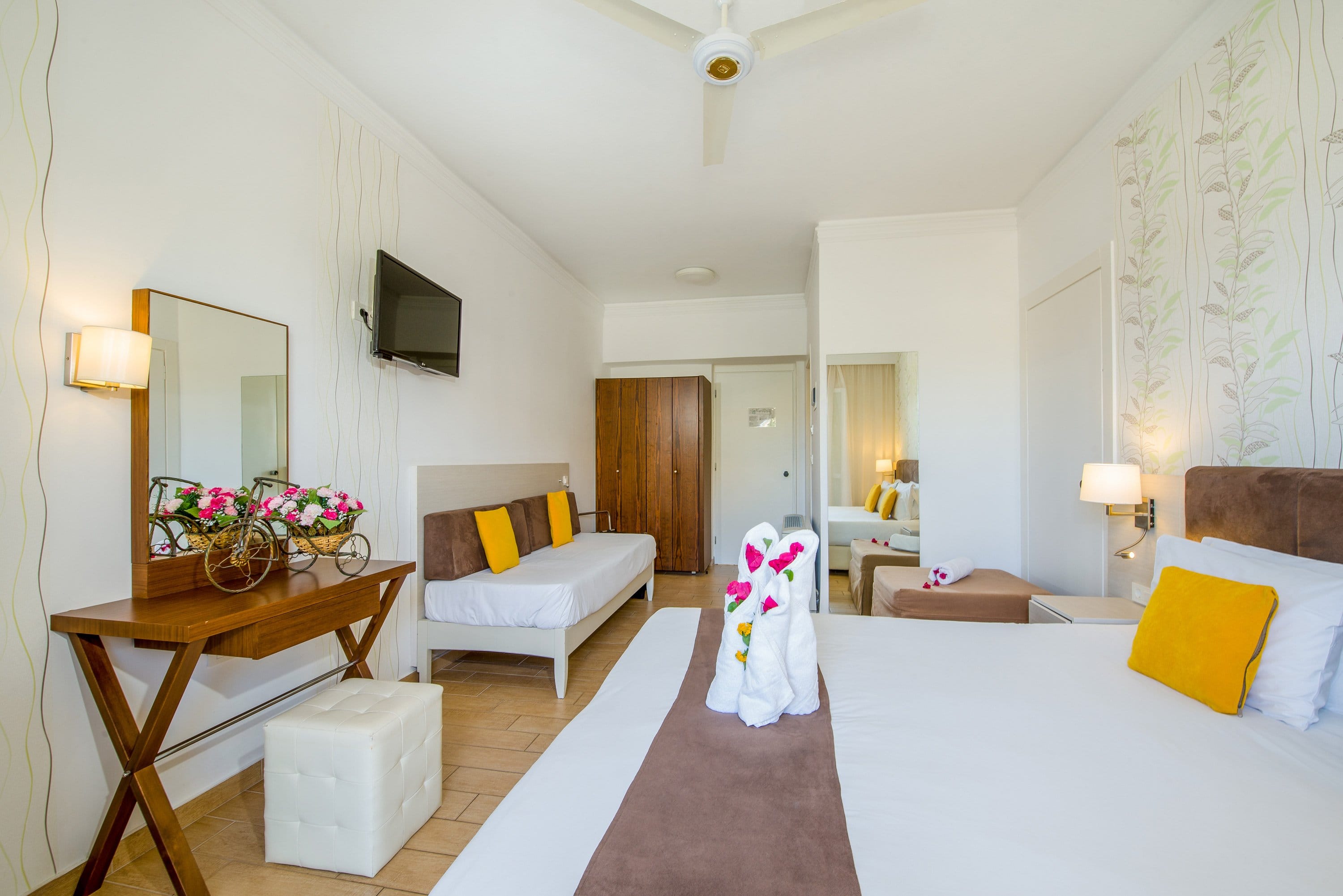 a bedroom with a bed and a chair