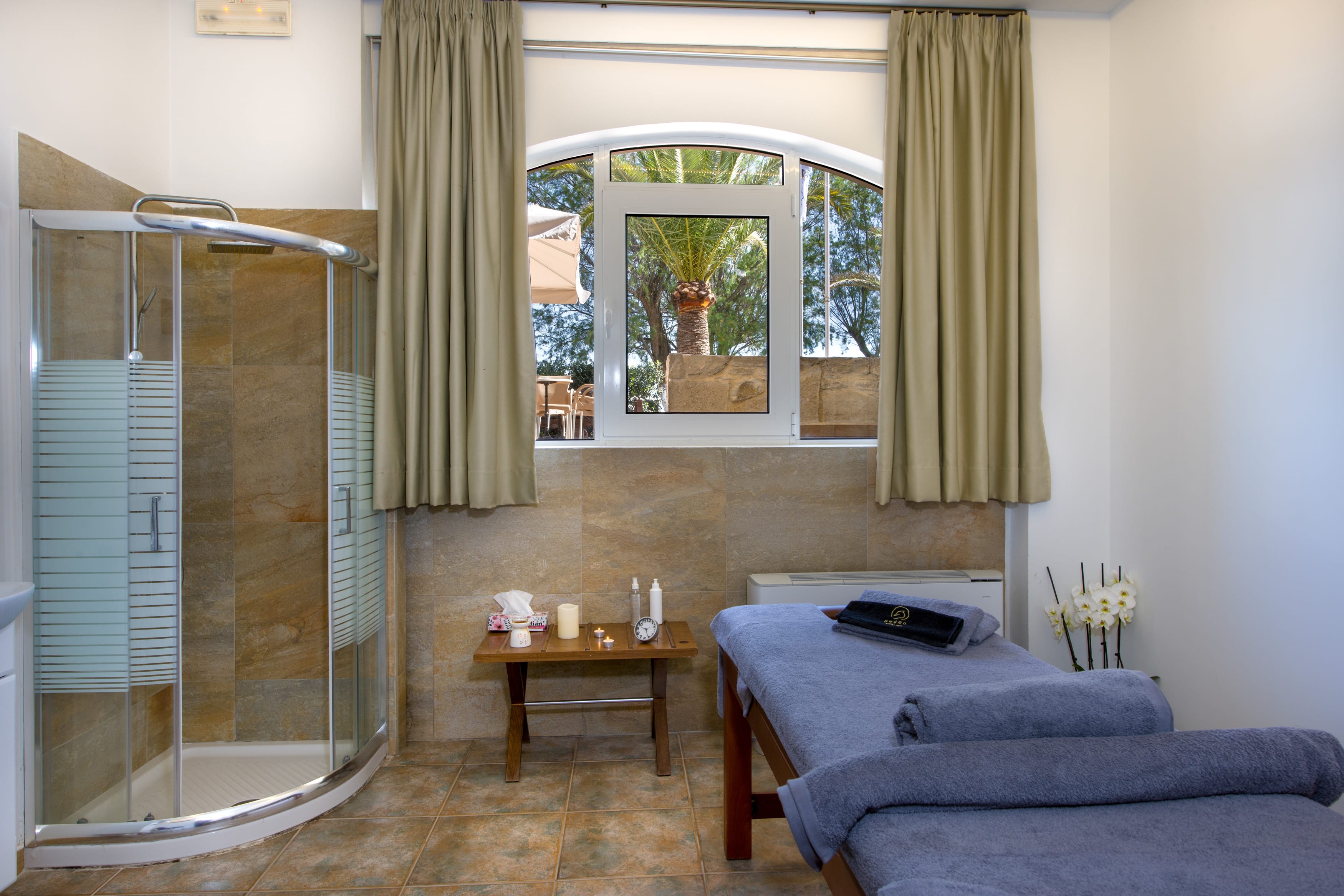 a room with a bed and a window