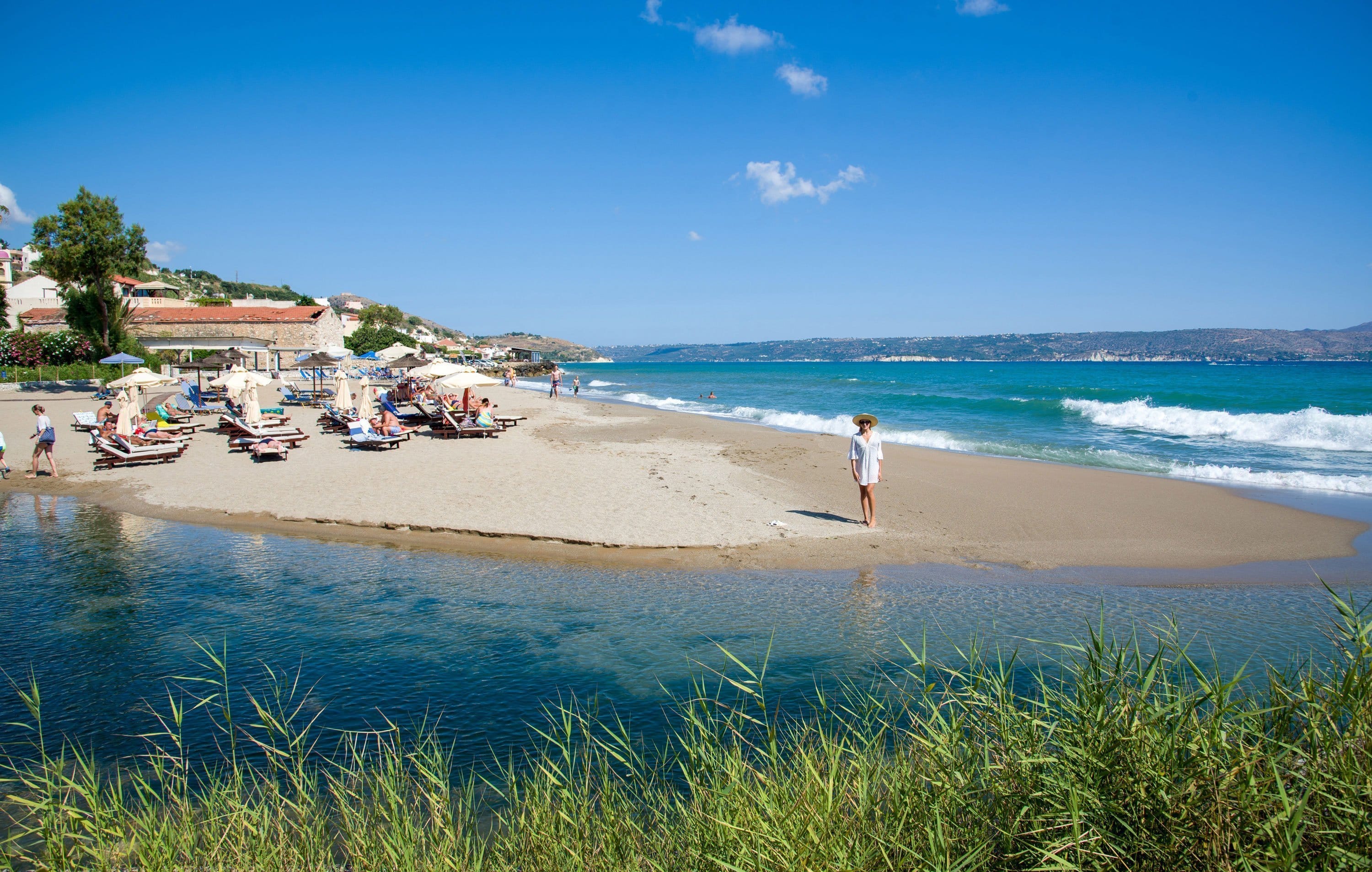 a person walking on a beach