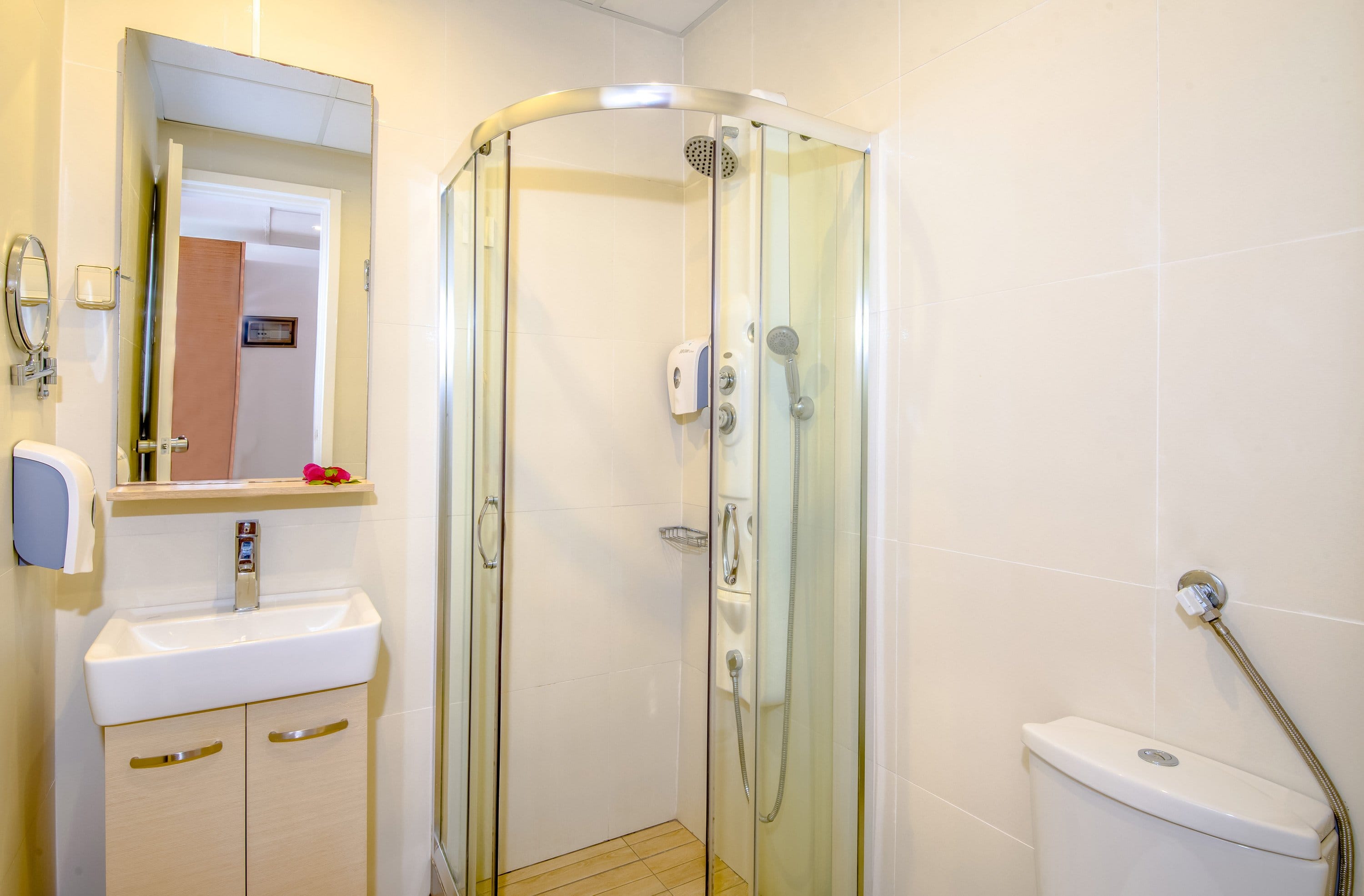 a bathroom with a glass shower