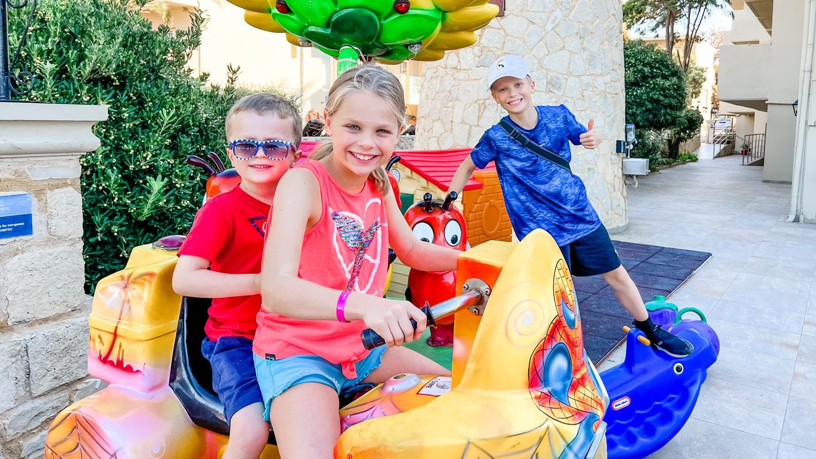 a group of kids playing in a play set