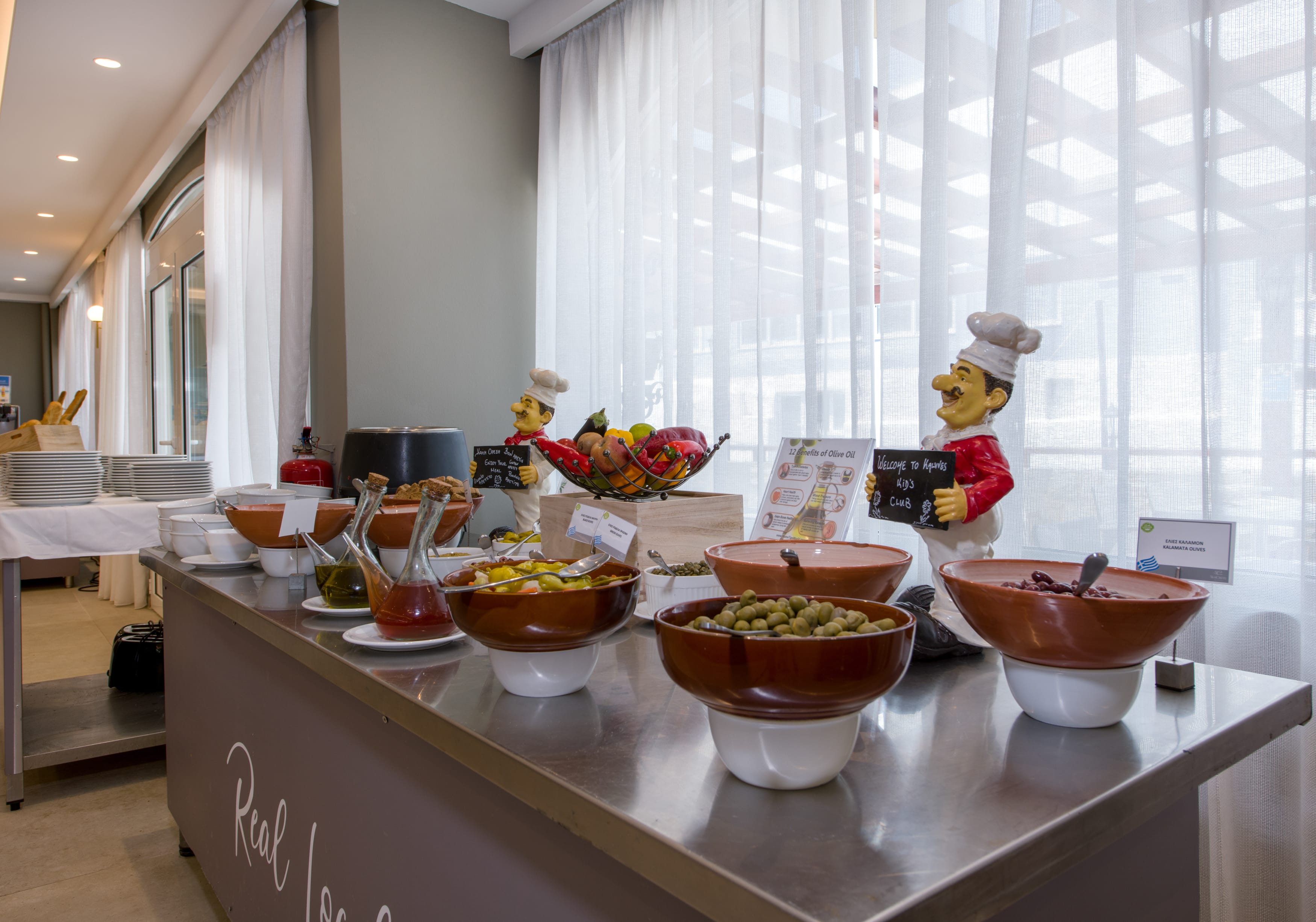 a buffet with bowls of food