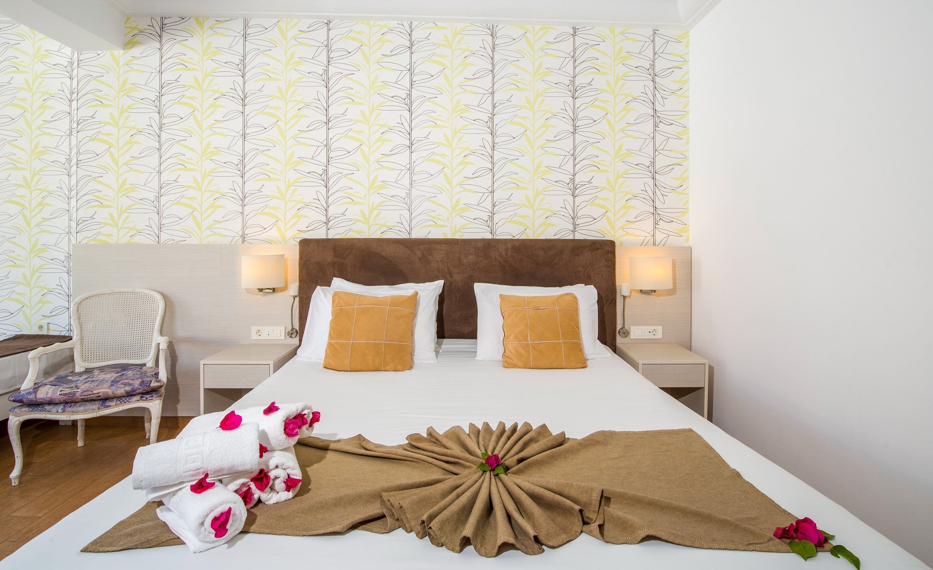 a bed with a white bed spread
