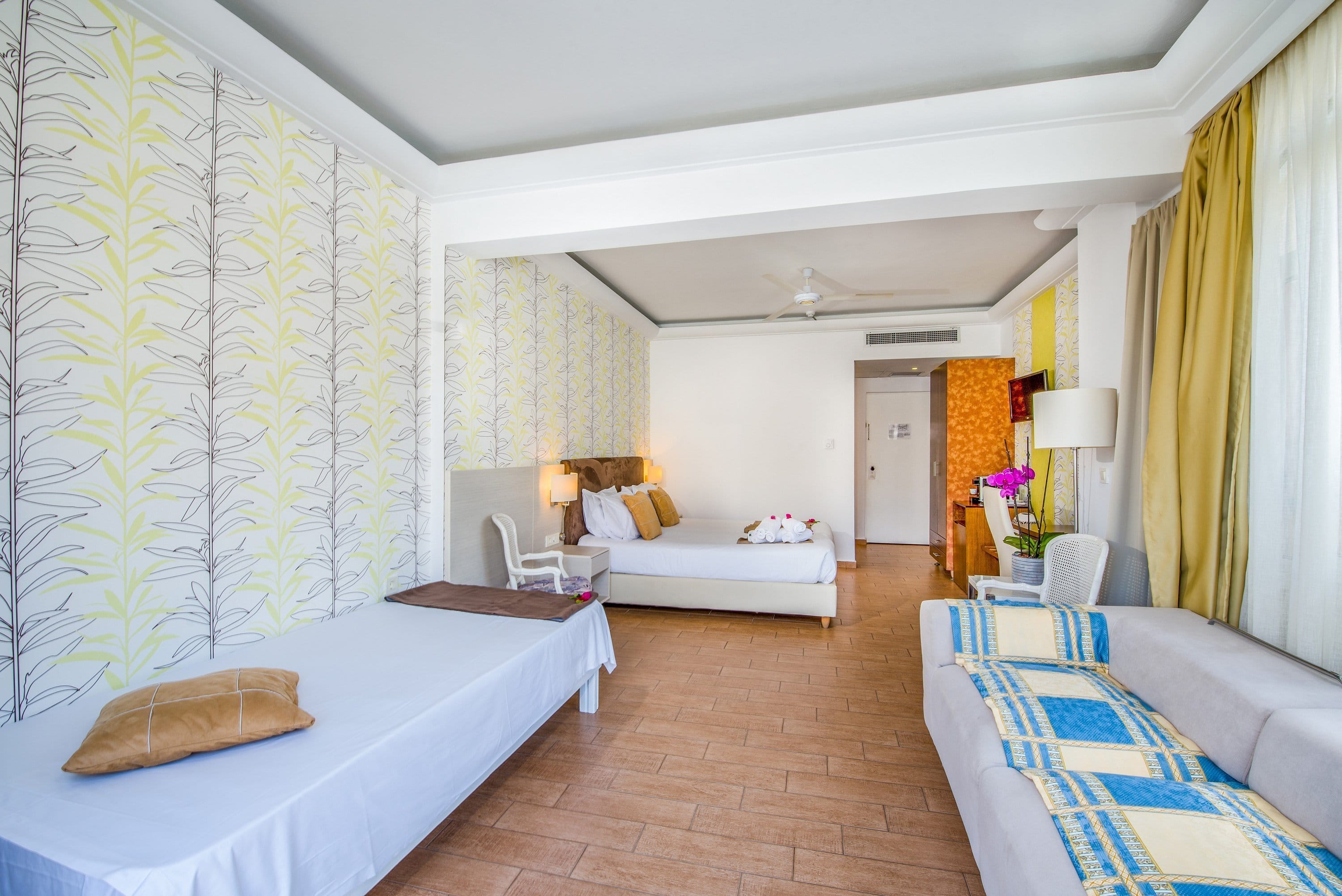 a room with a bed and couch